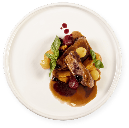 Photo d'une assiette de viande avec de la sauce